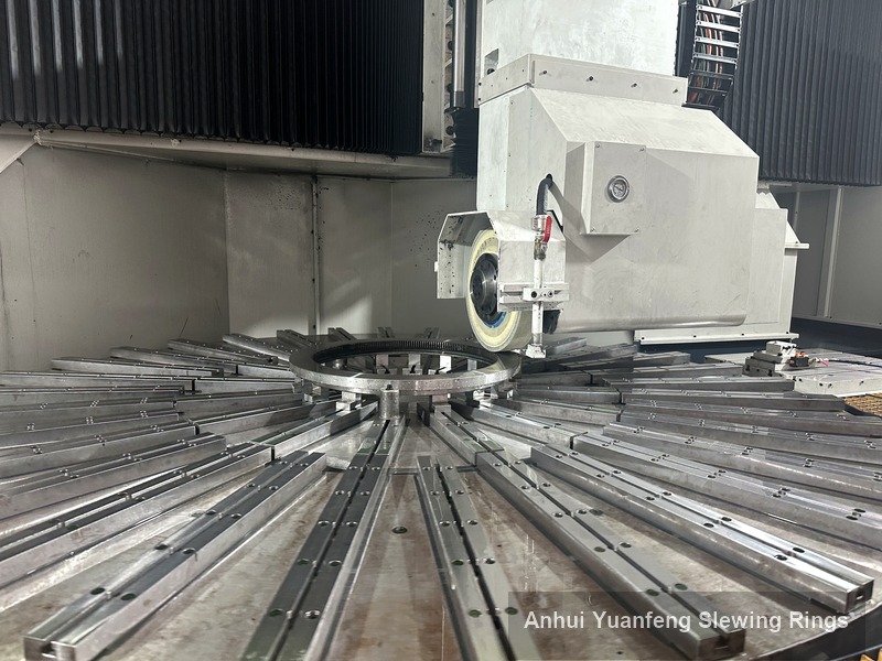 Raceway grinding of a large-diameter slewing ring on an in-house vertical grinder